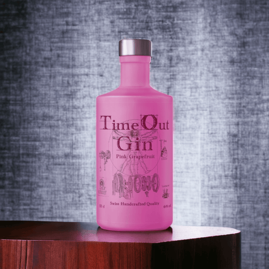 Bottle of TimeOut Gin Pink Grapefruit 50cl showcasing Swiss handcrafted quality and refreshing flavors for gin lovers.